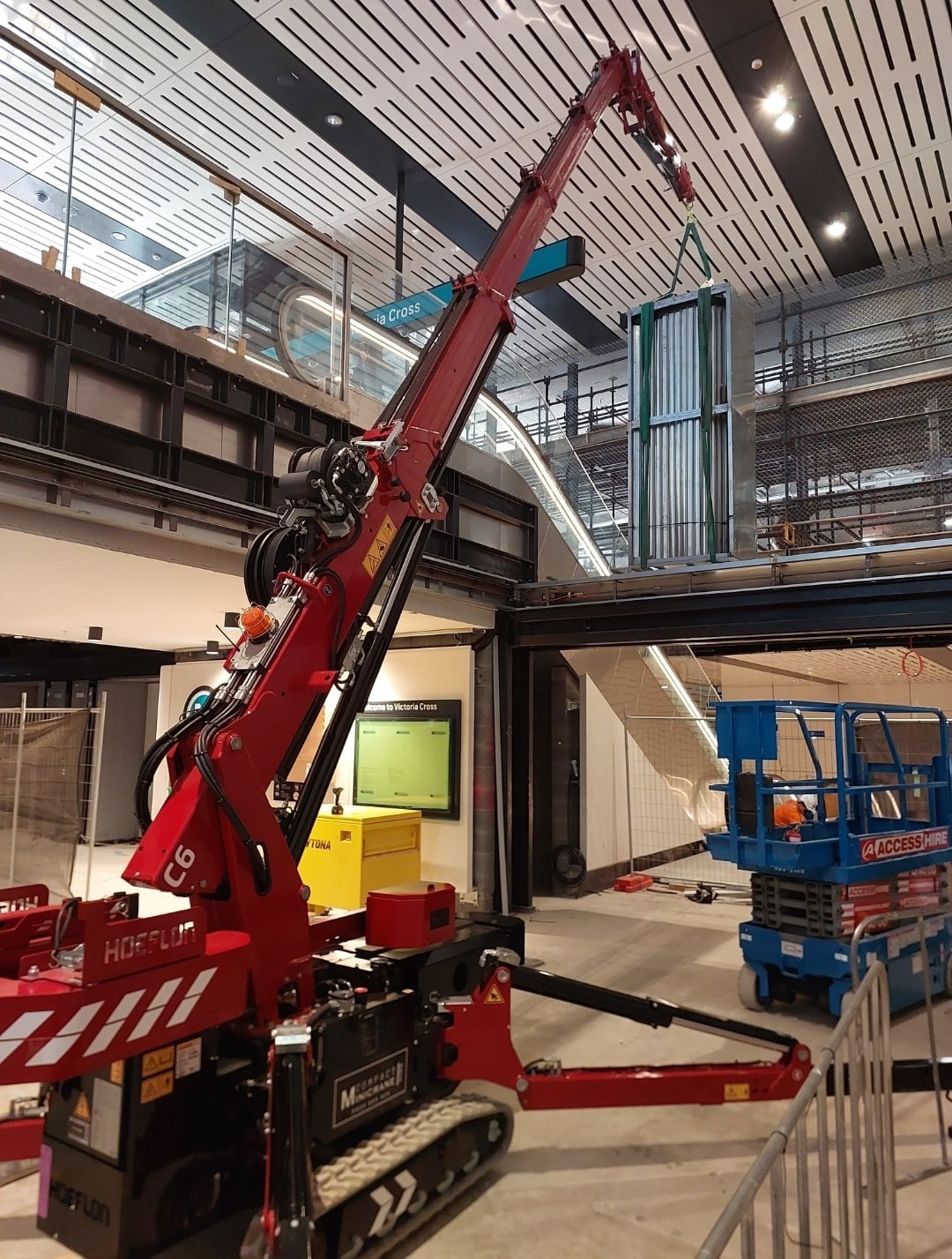 Hoeflon C6 installing structural steel on a construction site in Sydney, NSW.