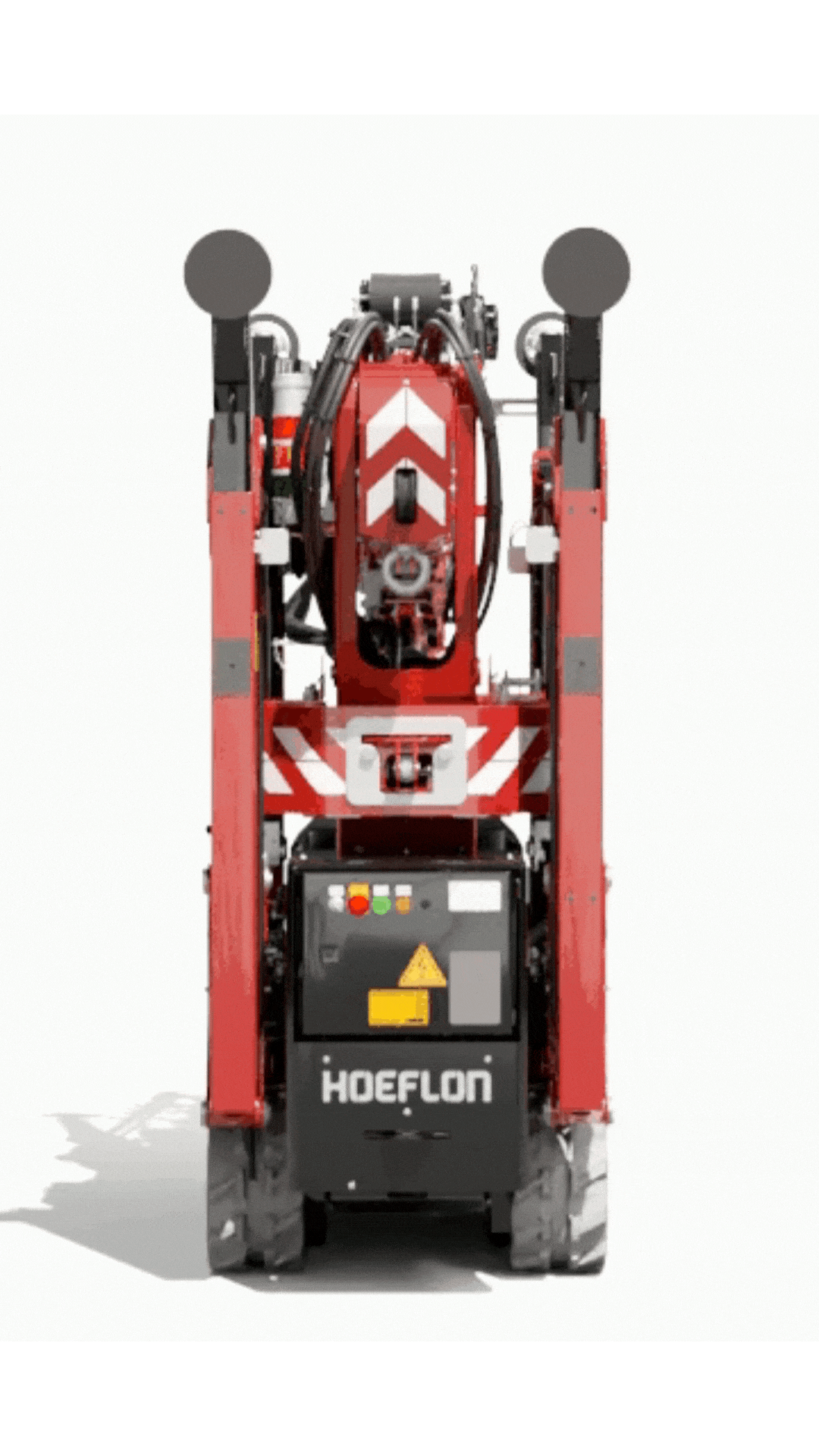 The hoeflon c6 crane can extend the tracks to provide better ground stability, or retracks them for squeezing through tight spaces.